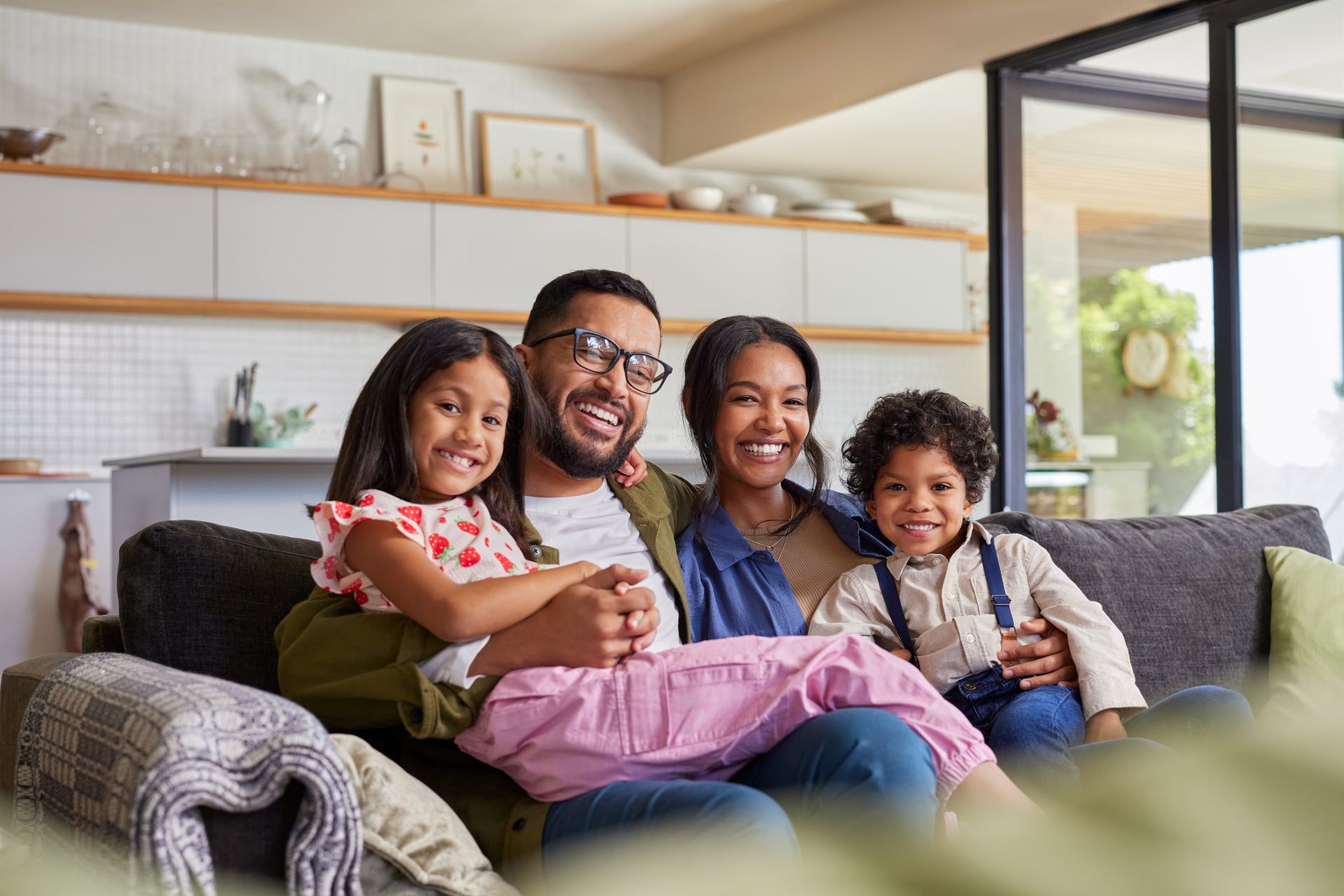 Happy family sitting on the couch