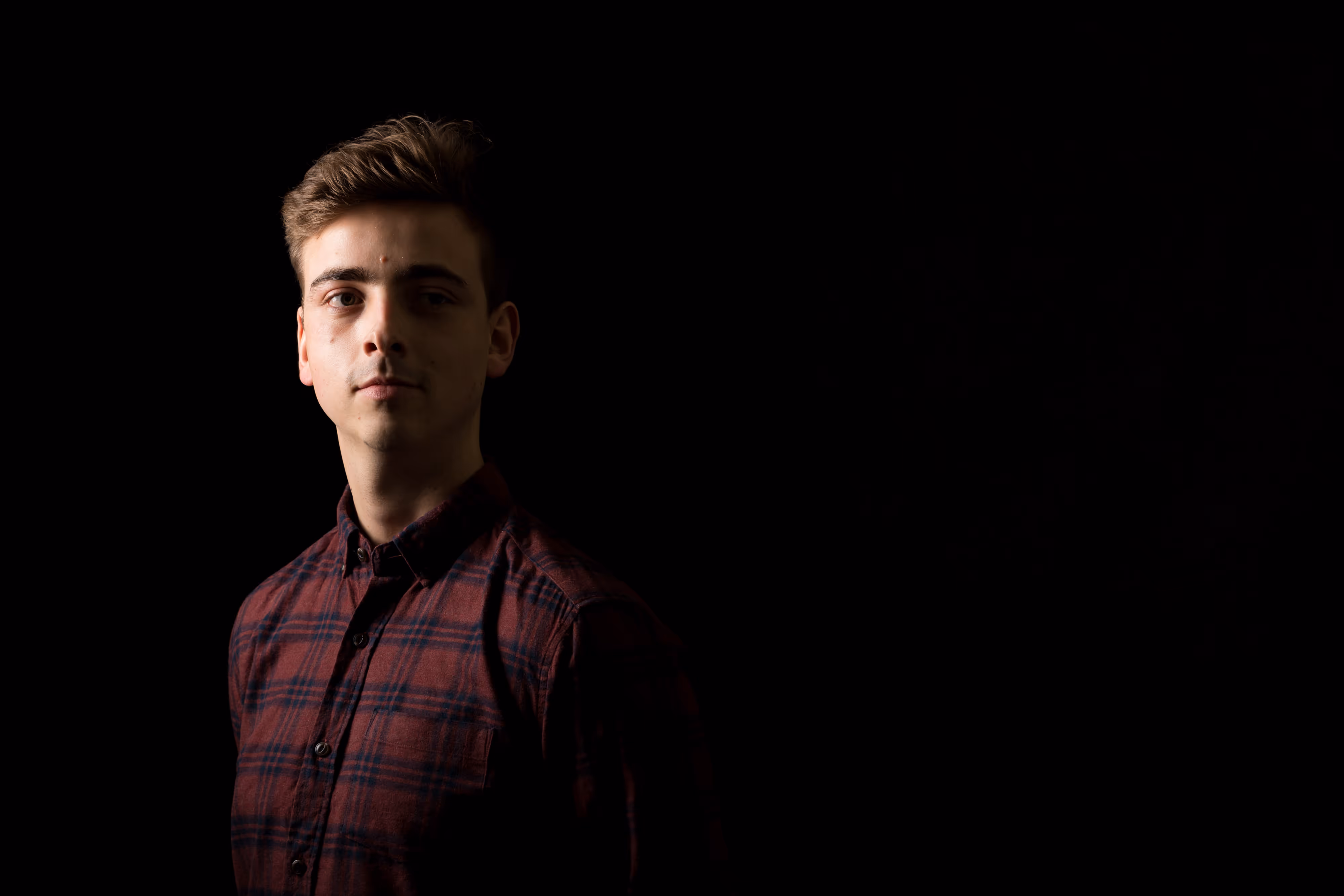 low key studio photo of dj whiney