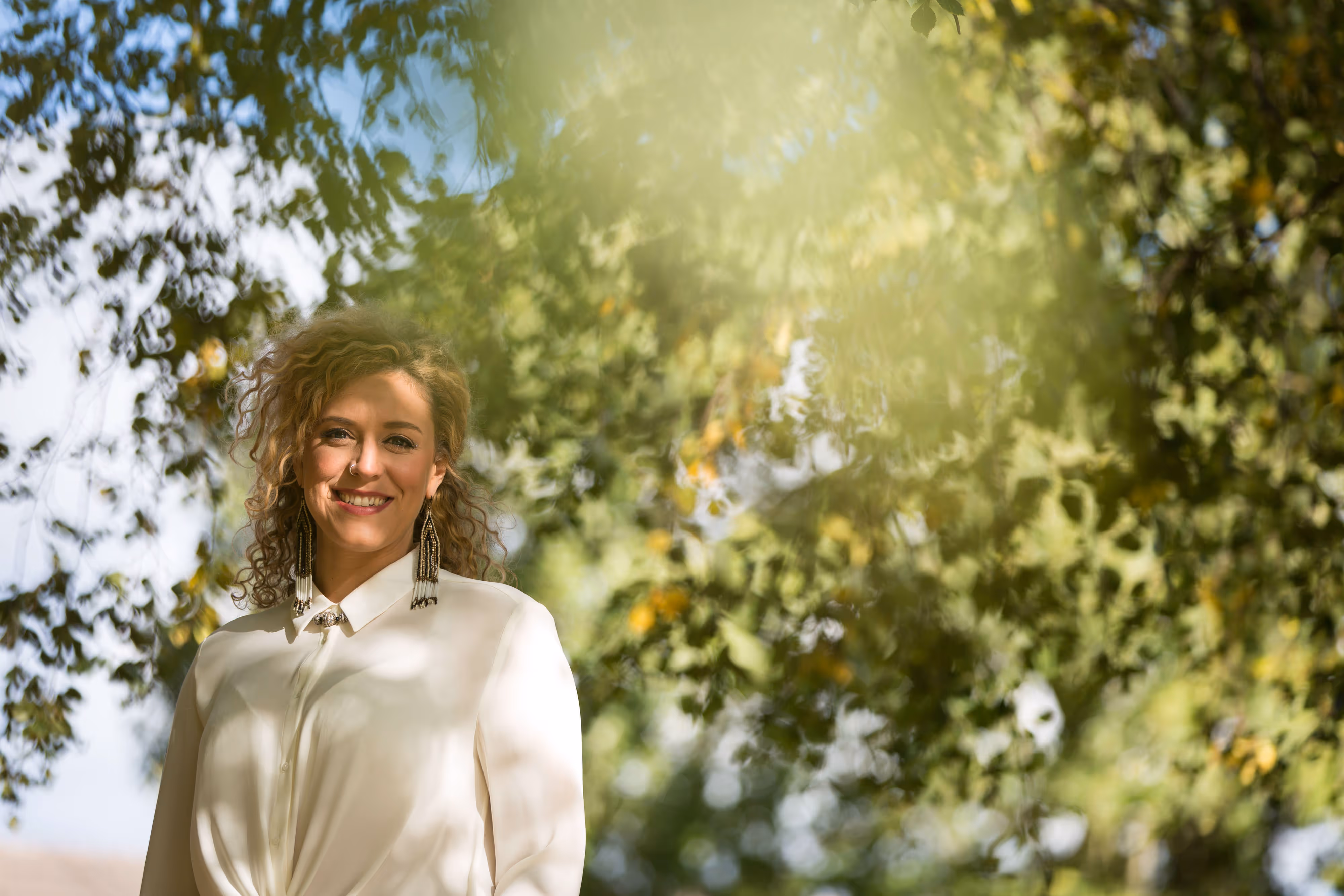 country band singer songwriter with green foliage