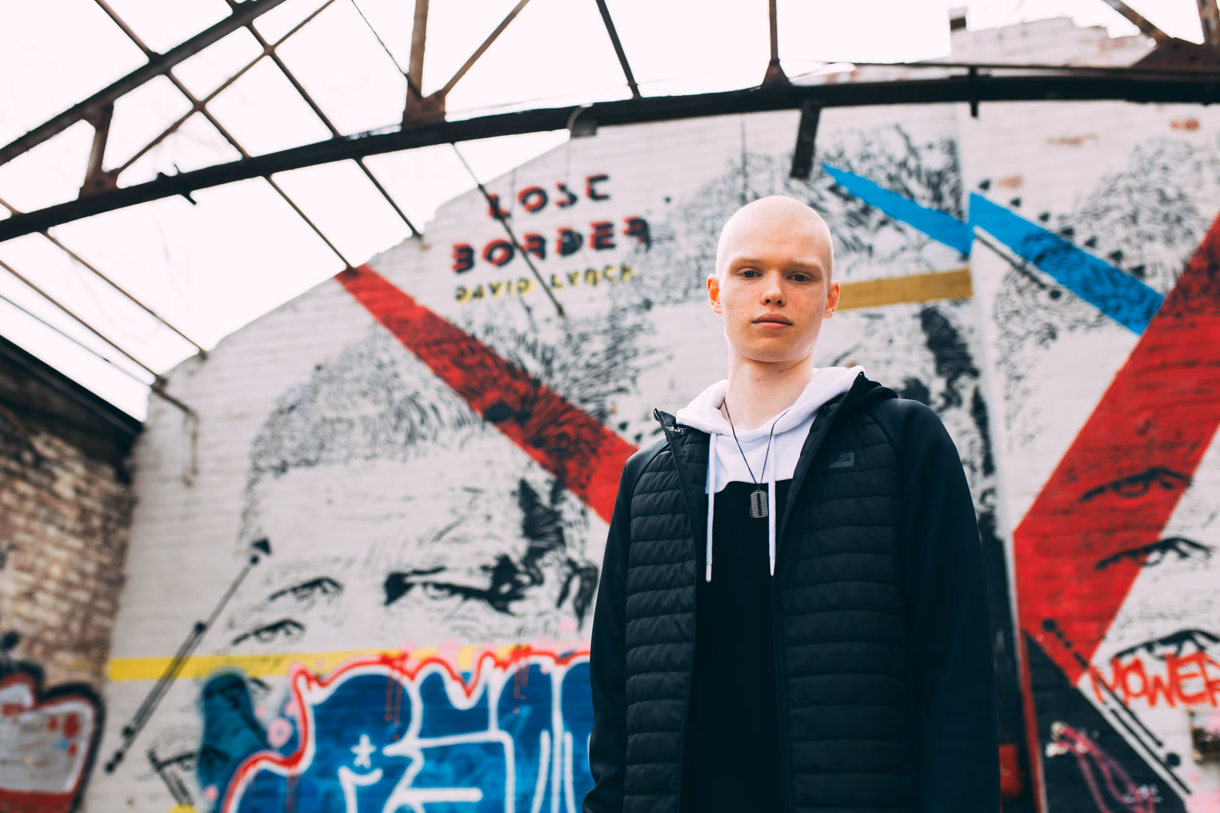 professional producer with colourful wall