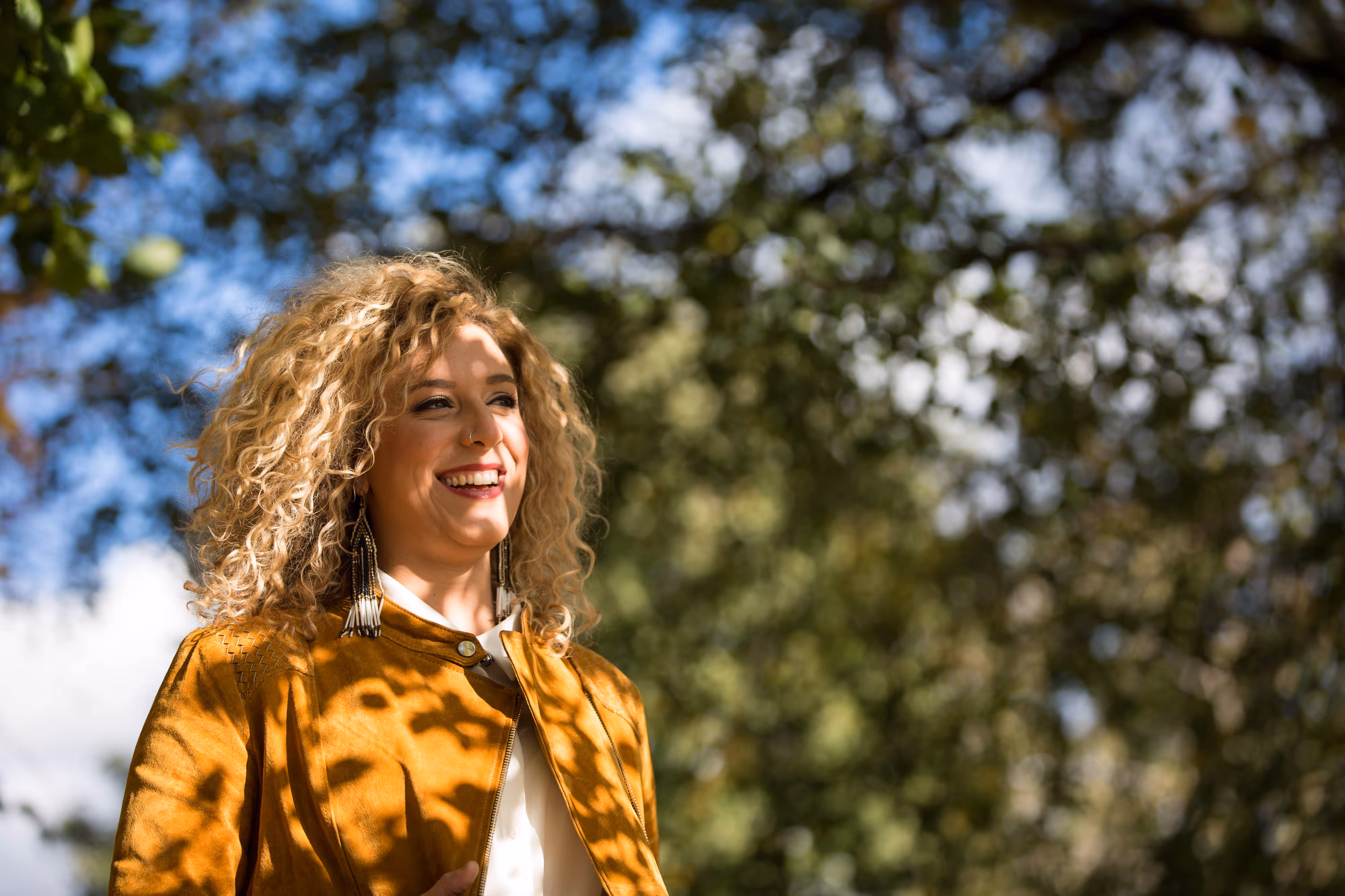 singer songwriter with speckled autumn light