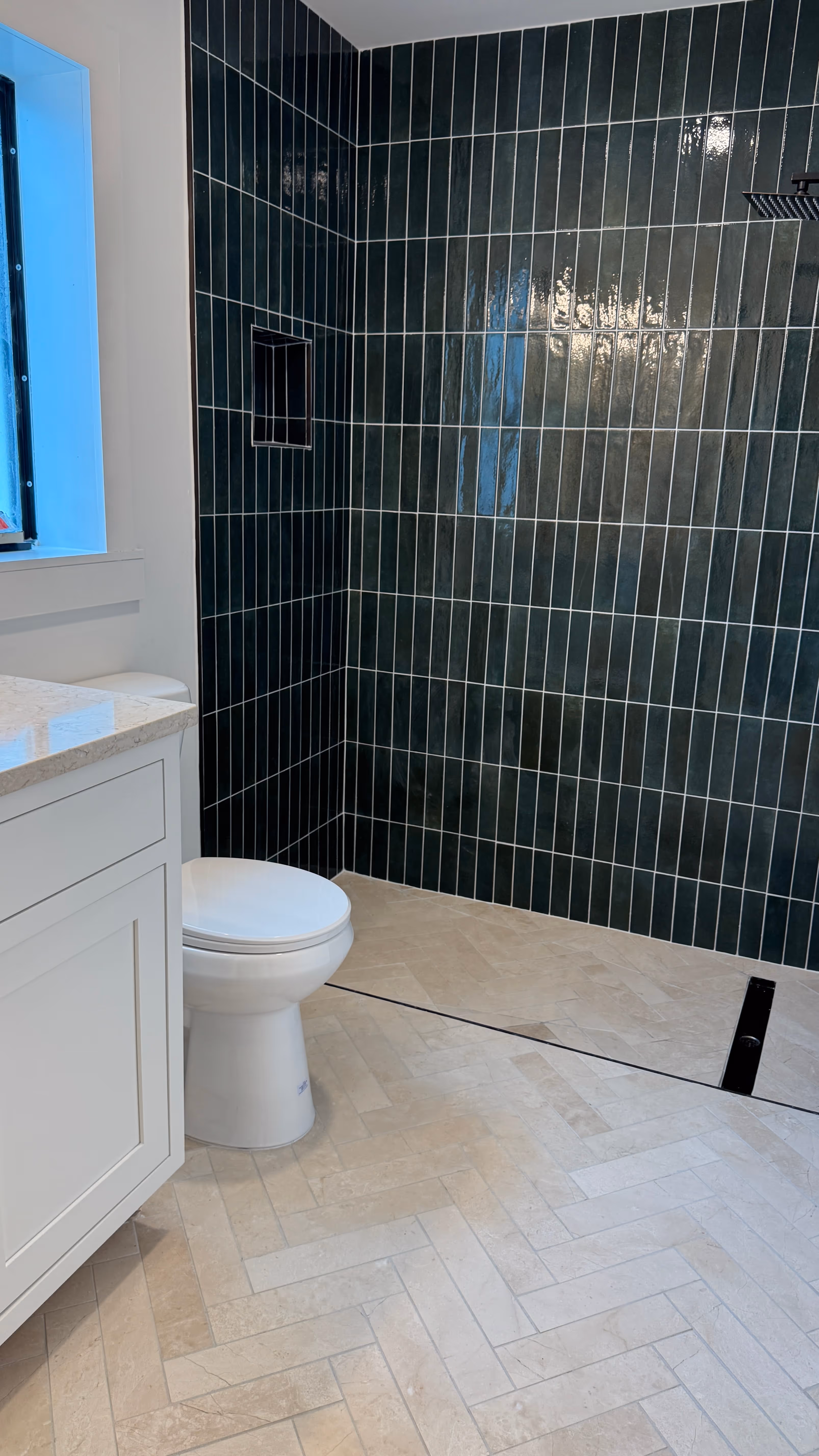 a new emerald green tile shower installed in Tampa