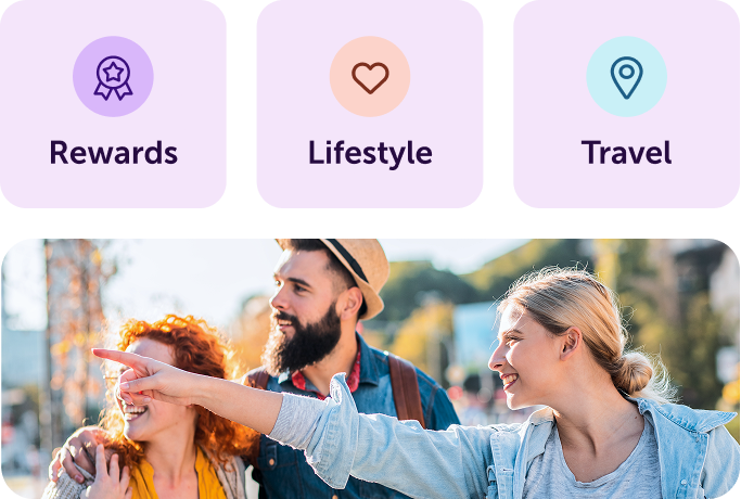 Diverse group of colleagues smiling and applauding in a meeting with icons for Mental Health, Recognition, and Travel & Fun above them.