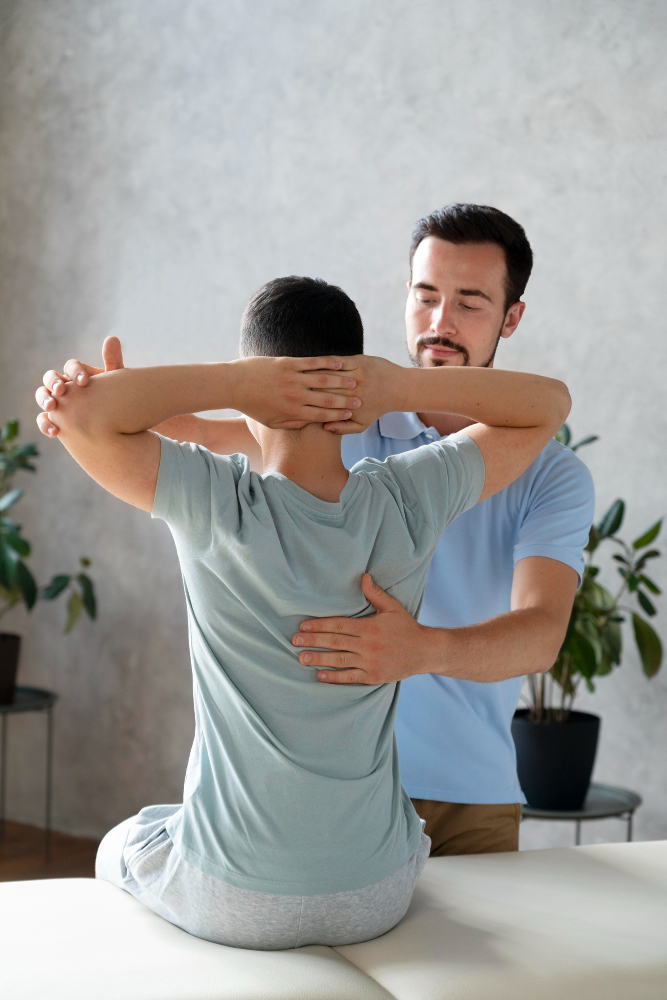 Physical therapist treating various knee pain conditions including sports injuries and post-surgical recovery at Aura Wellness Oakton clinic