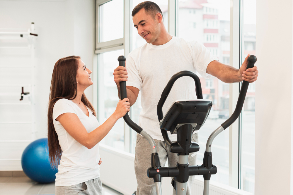 Physical therapist treating various knee pain conditions including sports injuries and post-surgical recovery at Aura Wellness Oakton clinic