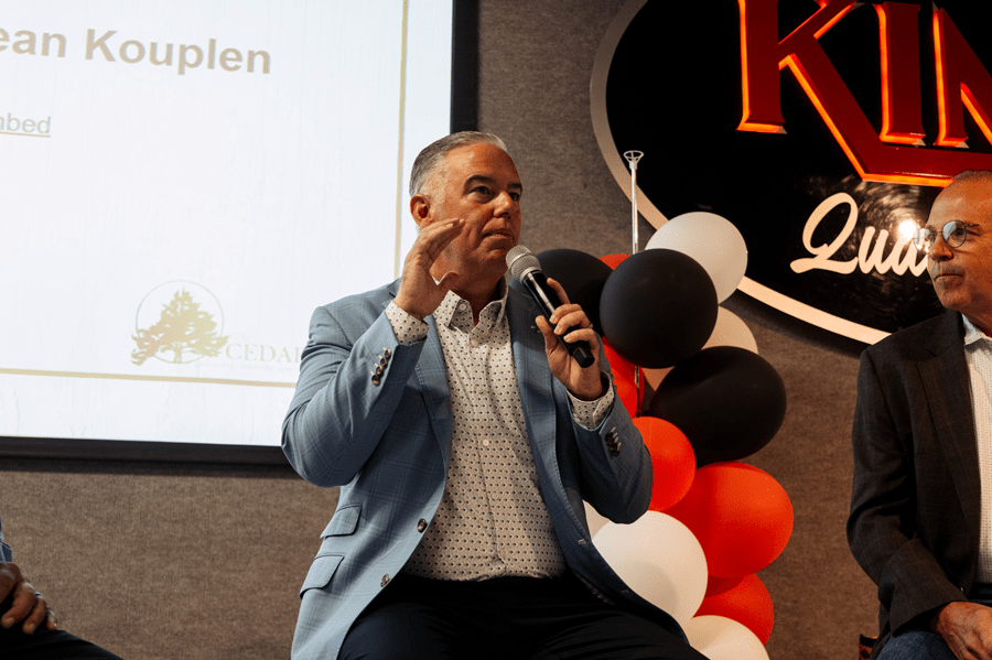 Cedar Gate member speaking at an event