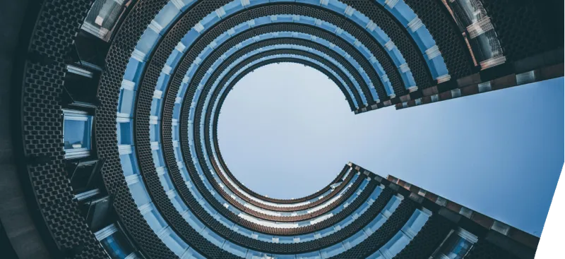 a very tall building with a sky in the background