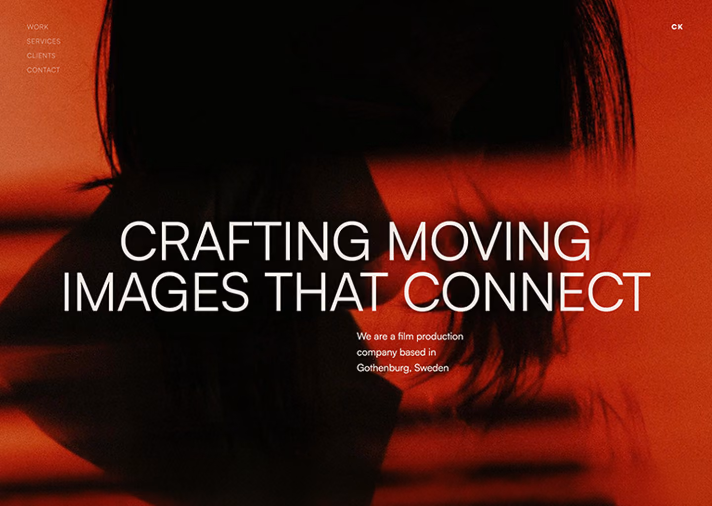 Silhouetted person with hair against a red background, text about a Gothenburg film production company.