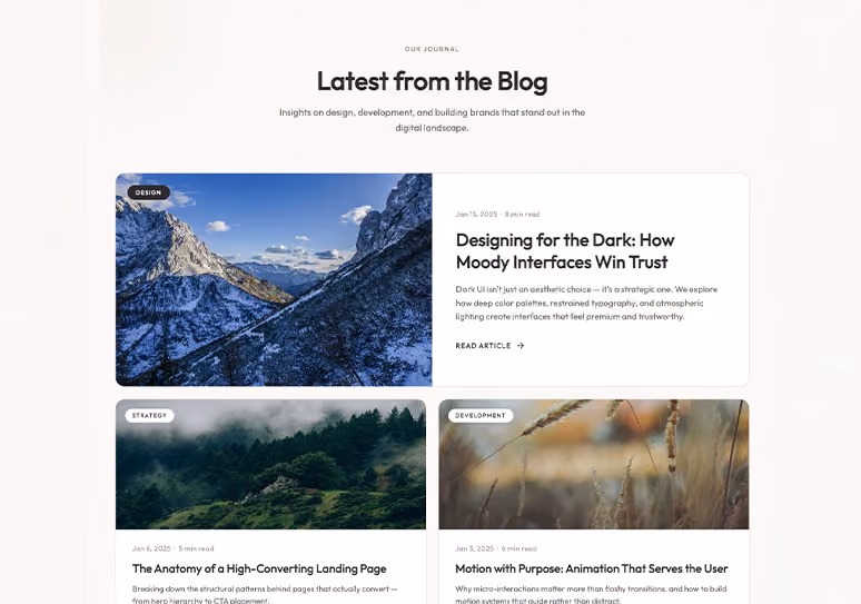 Blog page showing articles with mountain, forest, and wheat field images and titles on design, strategy, development.