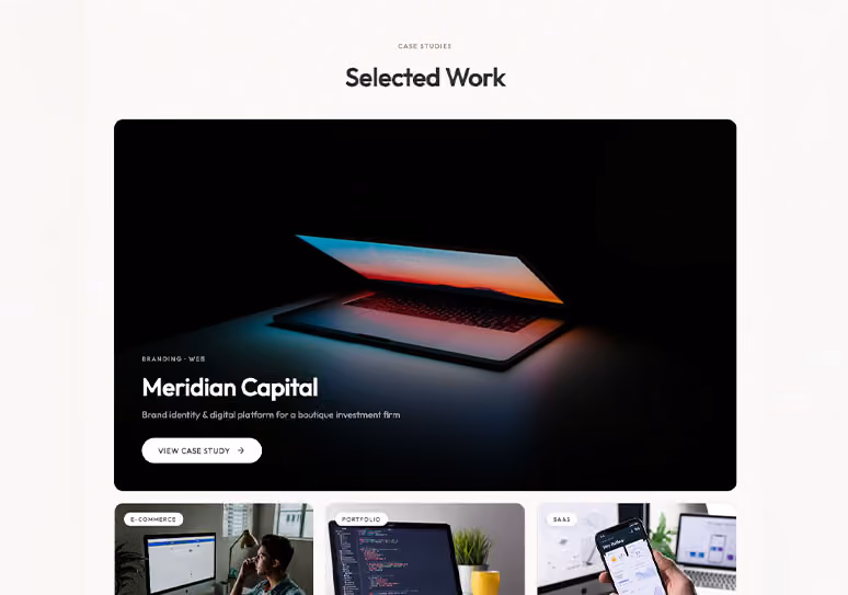 Partially open laptop showing sunset screen glow on a desk for Meridian Capital branding case study.