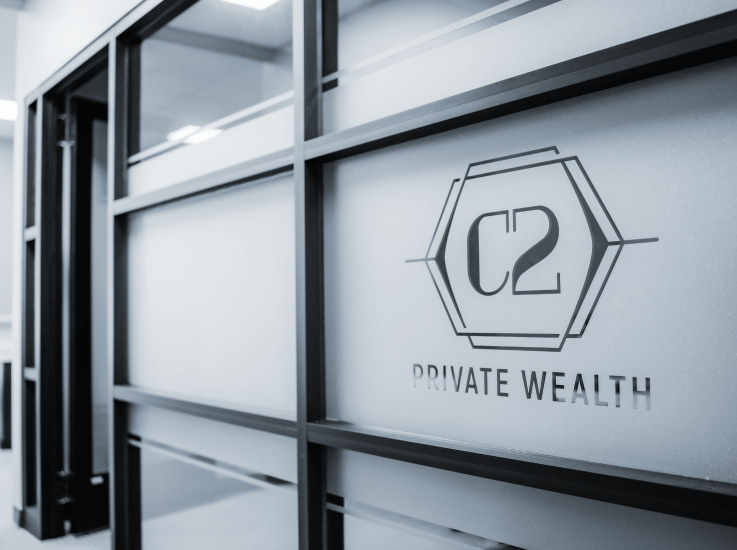 C2 Private Wealth logo on office window