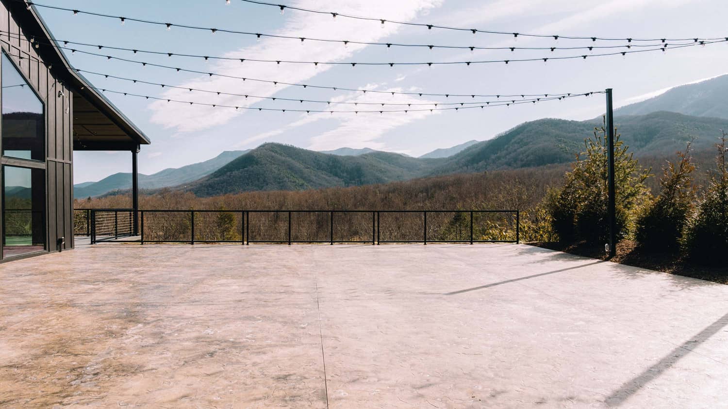 Open outdoor venue with string lights, surrounded by mountains, ideal for elopements in Gatlinburg.