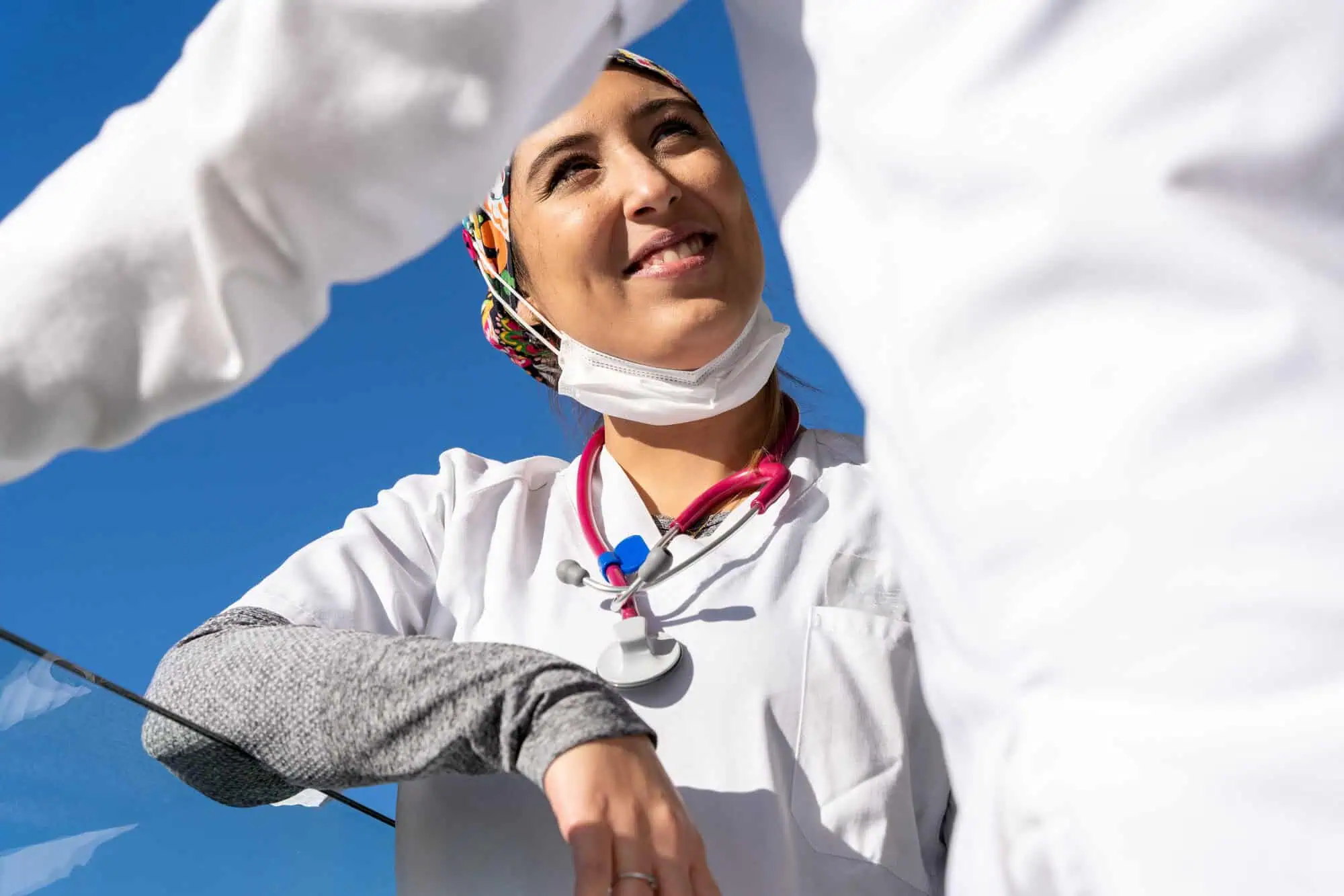 doctor smiling talking to colleague