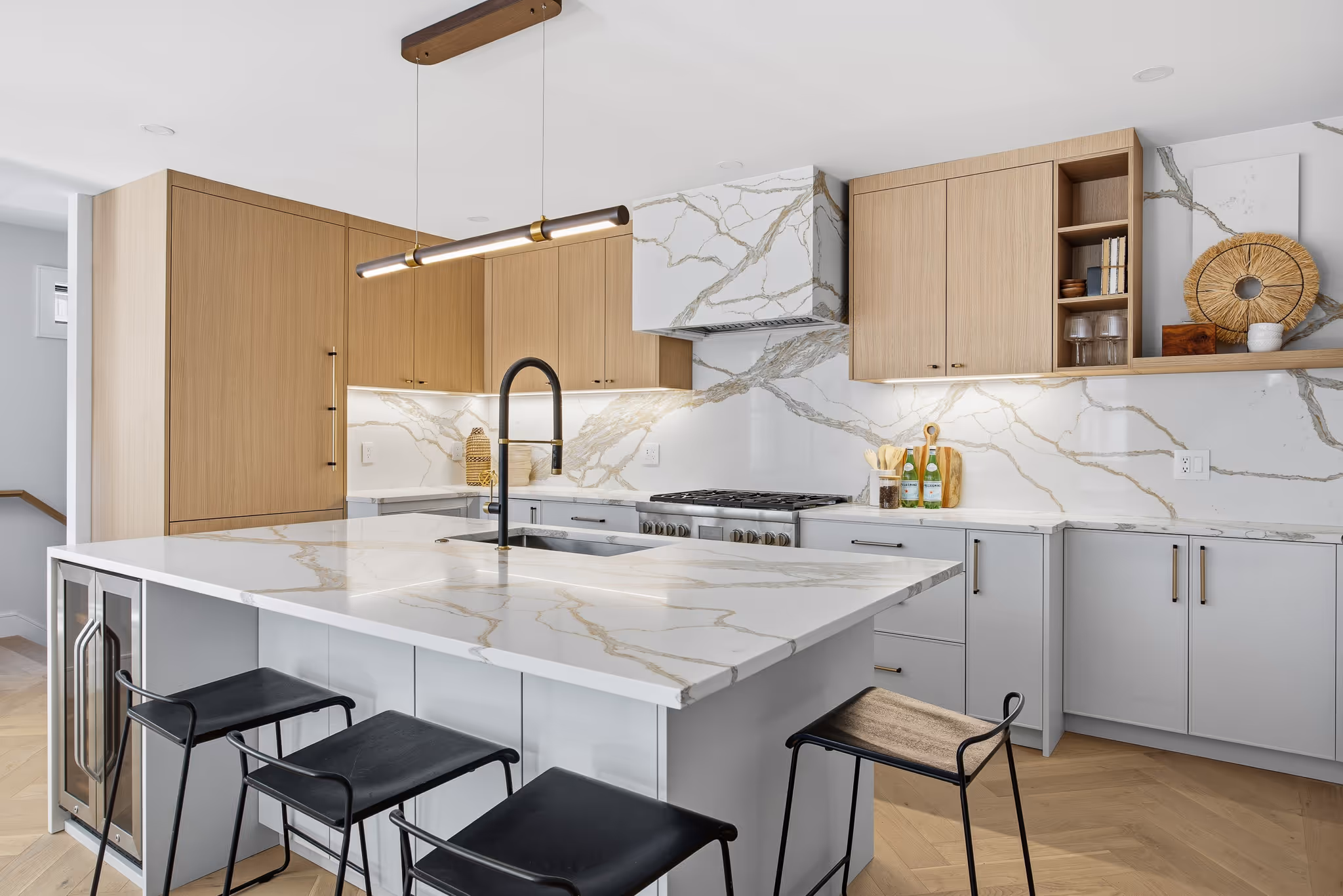 Open kitchen and dining room with wood floors and modern finishes – HDR real estate