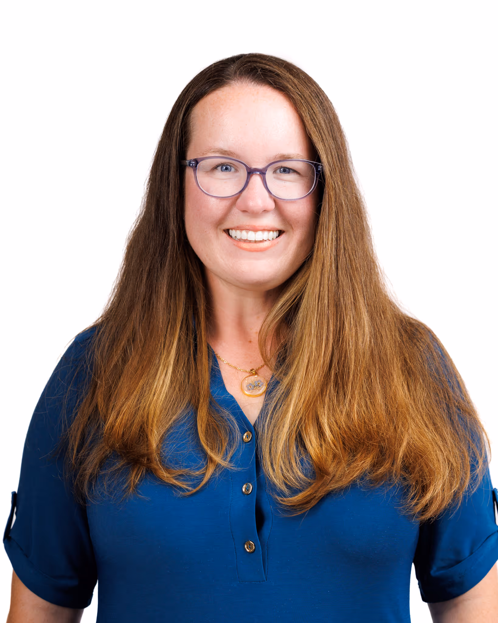 Professional headshot of woman with glasses on white background
