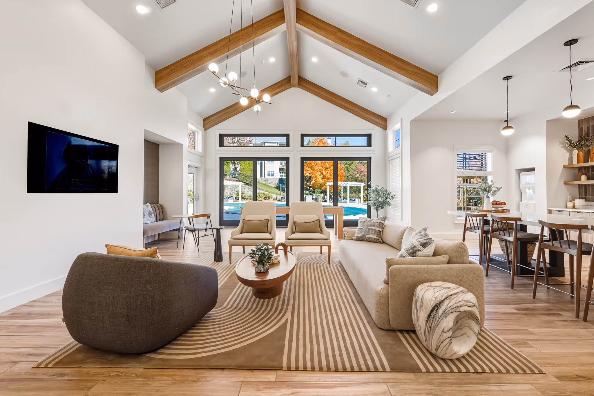 Spacious great room with high ceilings and natural light.
