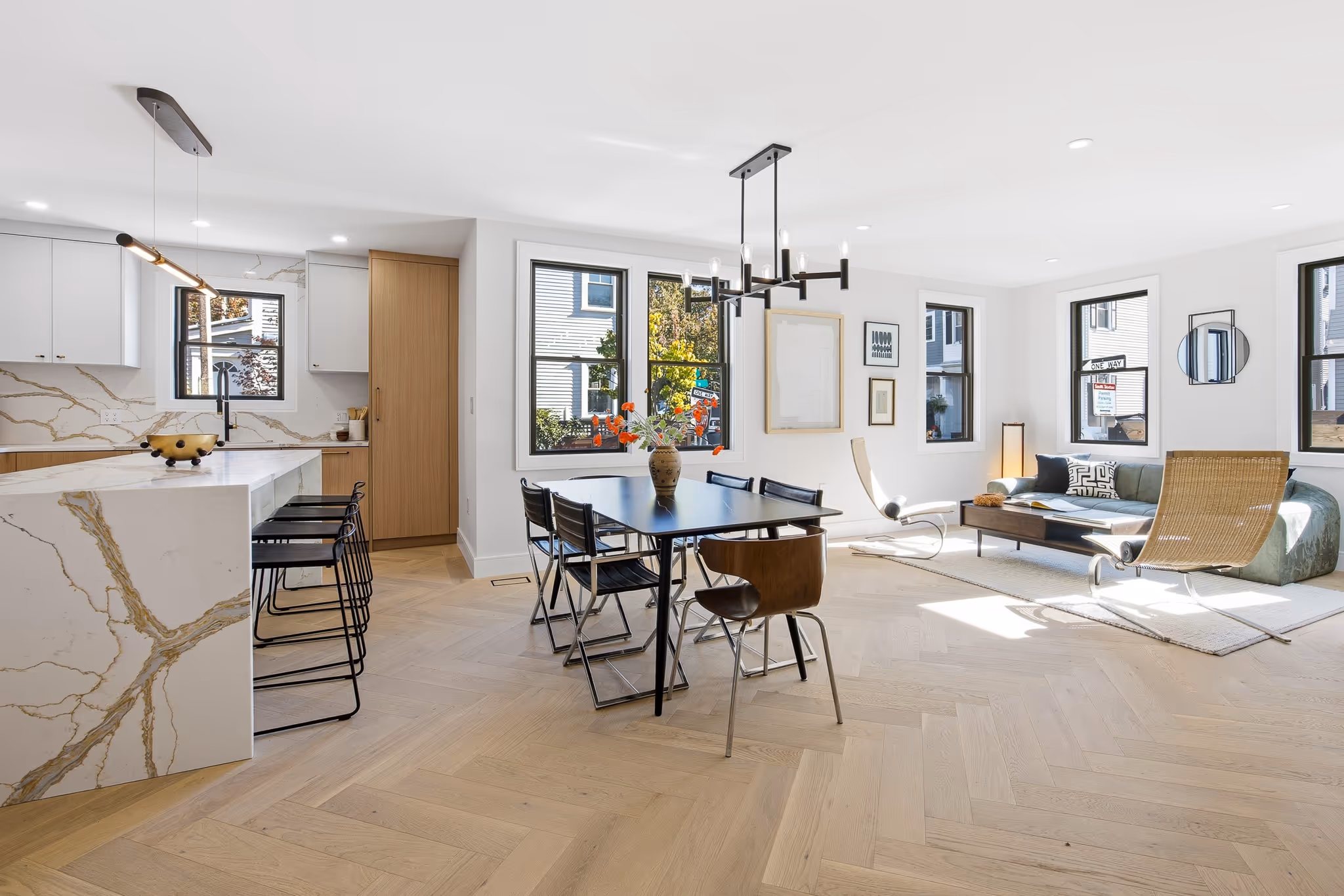 Dining area with natural light and cozy, minimalist design.