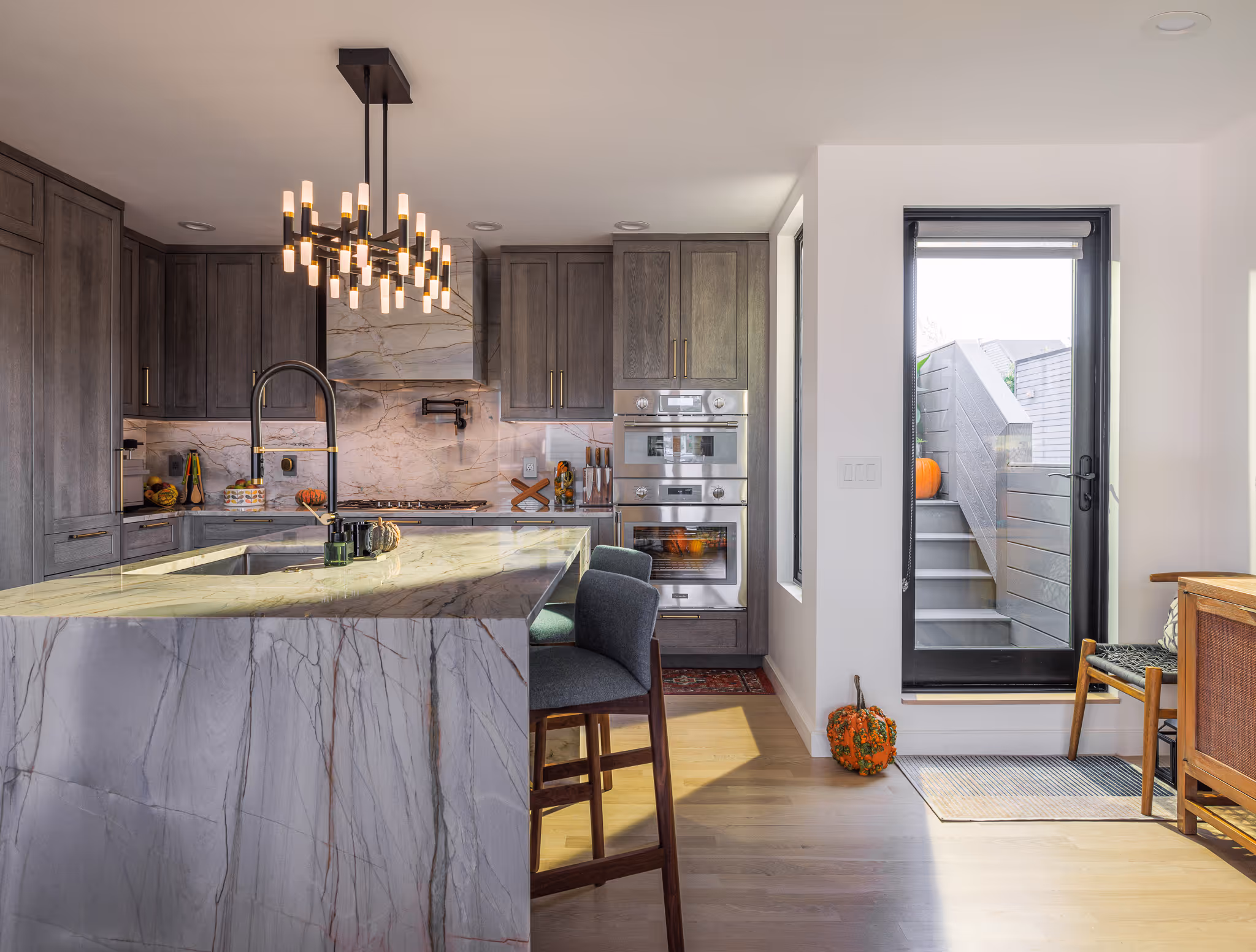 Open-concept kitchen with modern cabinetry and dining space.