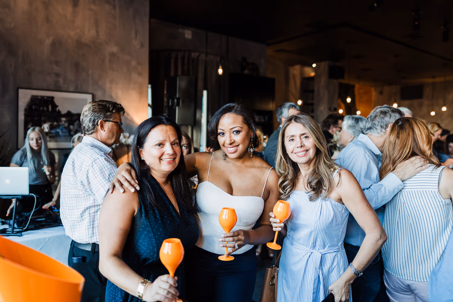 Friends socializing over coffee at a Boston event photographed by Boston event photographer.