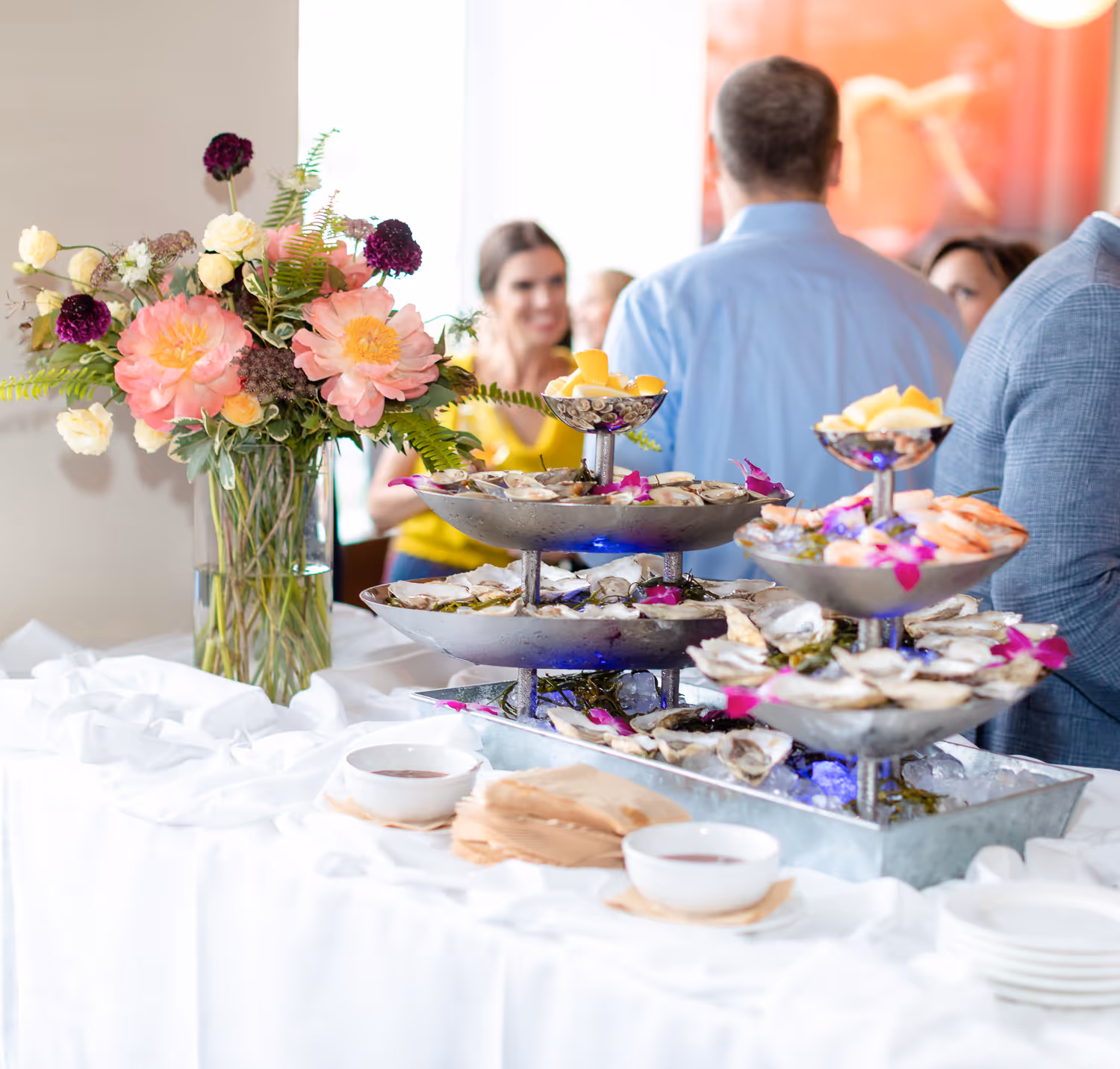 Food and drink table setup at a brunch event photographed by Boston event photographer.