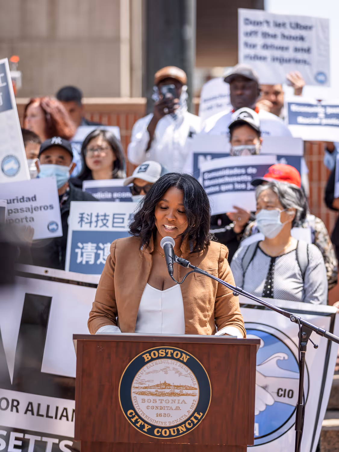 Woman speaking at a public event in Boston photographed by Boston event photographer.