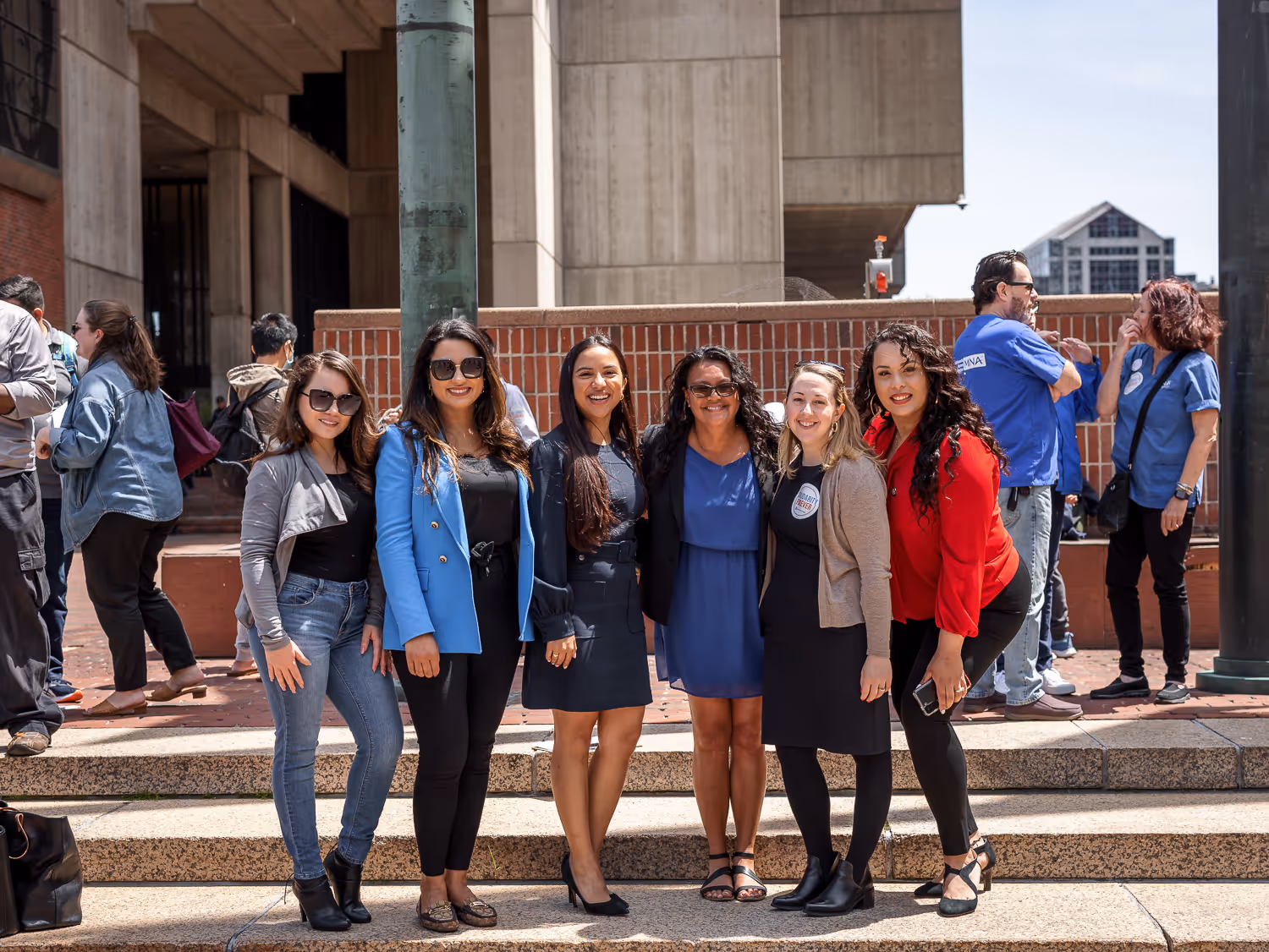 Group photo of attendees at a Boston outdoor event captured by Boston event photographer.