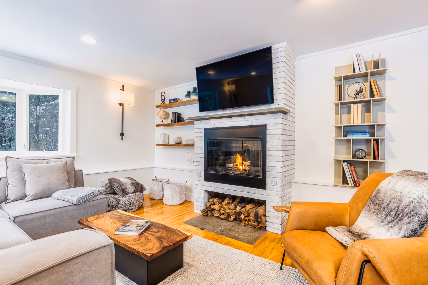 Cozy living room with fireplace — New England Airbnb interior photography