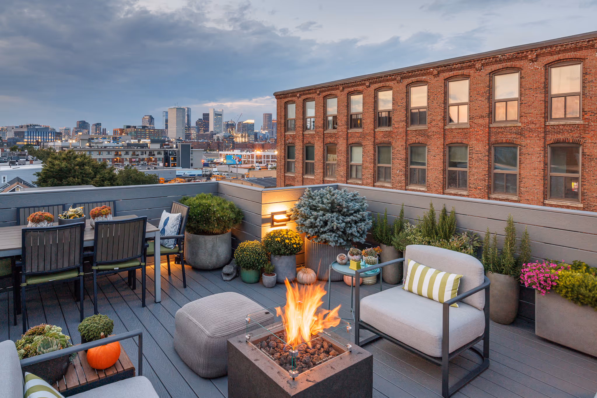 Urban rooftop firepit lounge — Boston Airbnb photography Massachusetts rentals