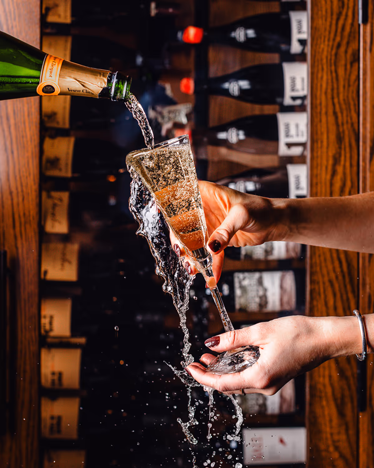 pouring chmpagne – Boston restaurant photographer.
