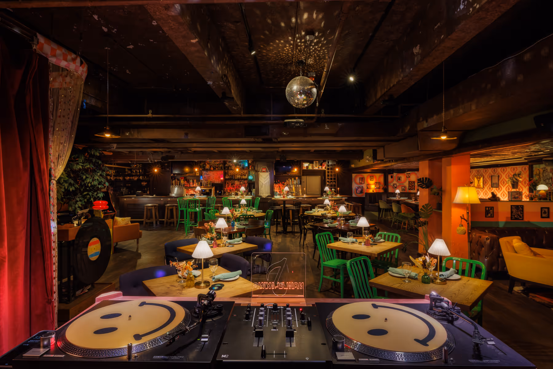 Wide angle interior shot of Back Bay Social Boston restaurant showing layered lighting and seating design