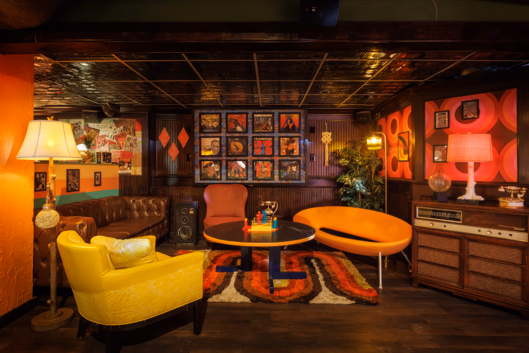 Corner lounge seating with yellow chairs at Back Bay Social in Back Bay Boston MA