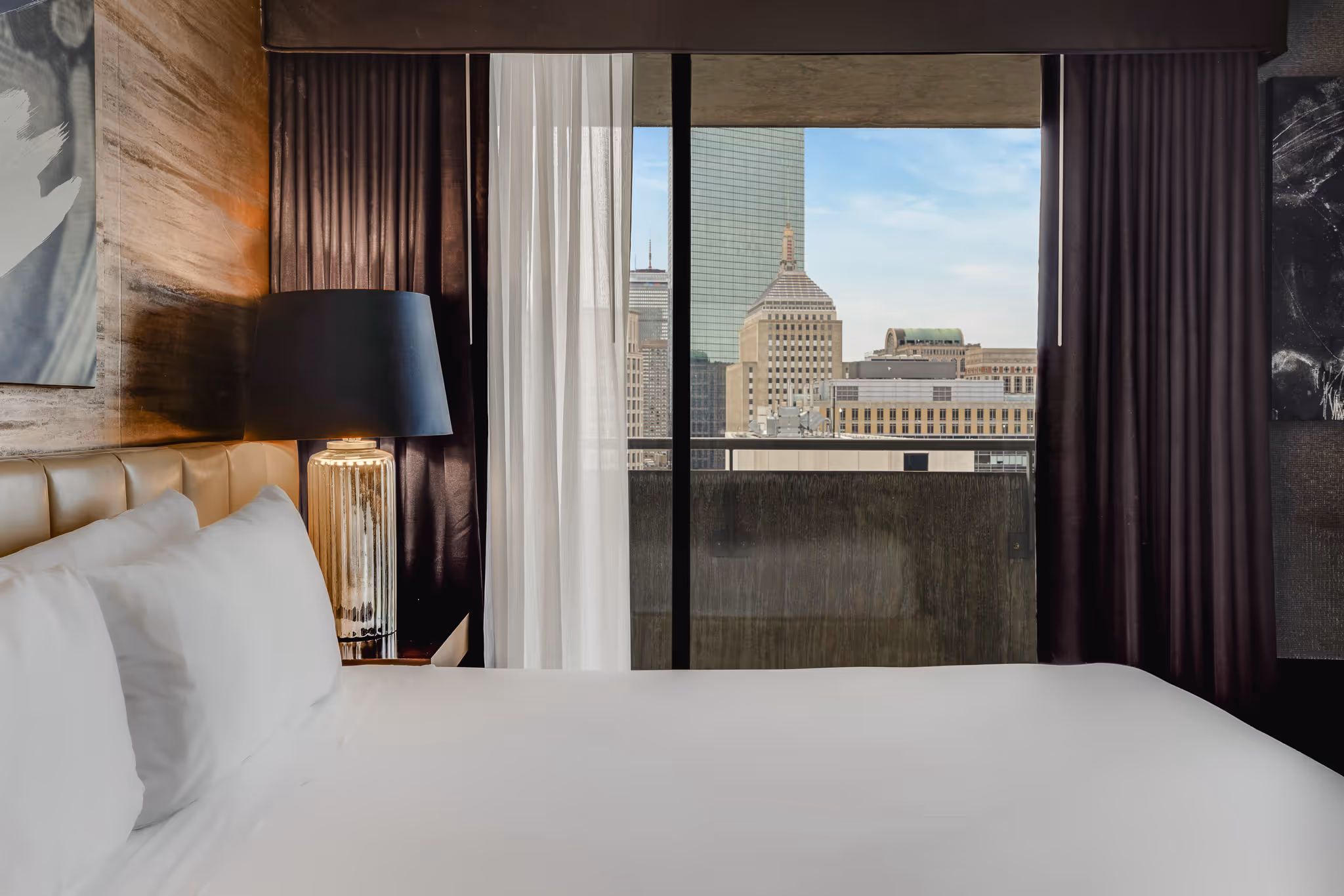 Hotel room with city view and window light in Boston