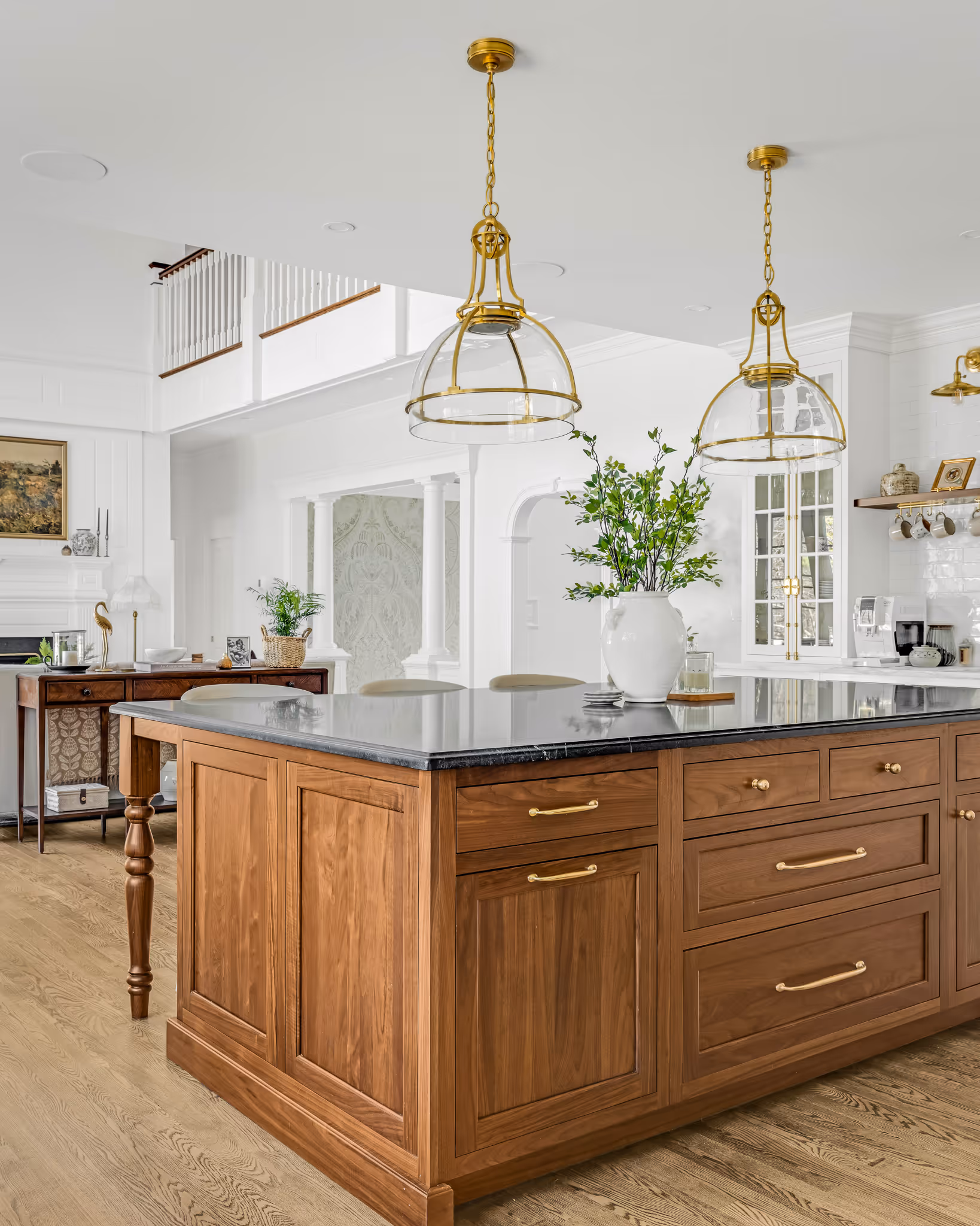 Wood kitchen island detail with storage and seating in Boston home