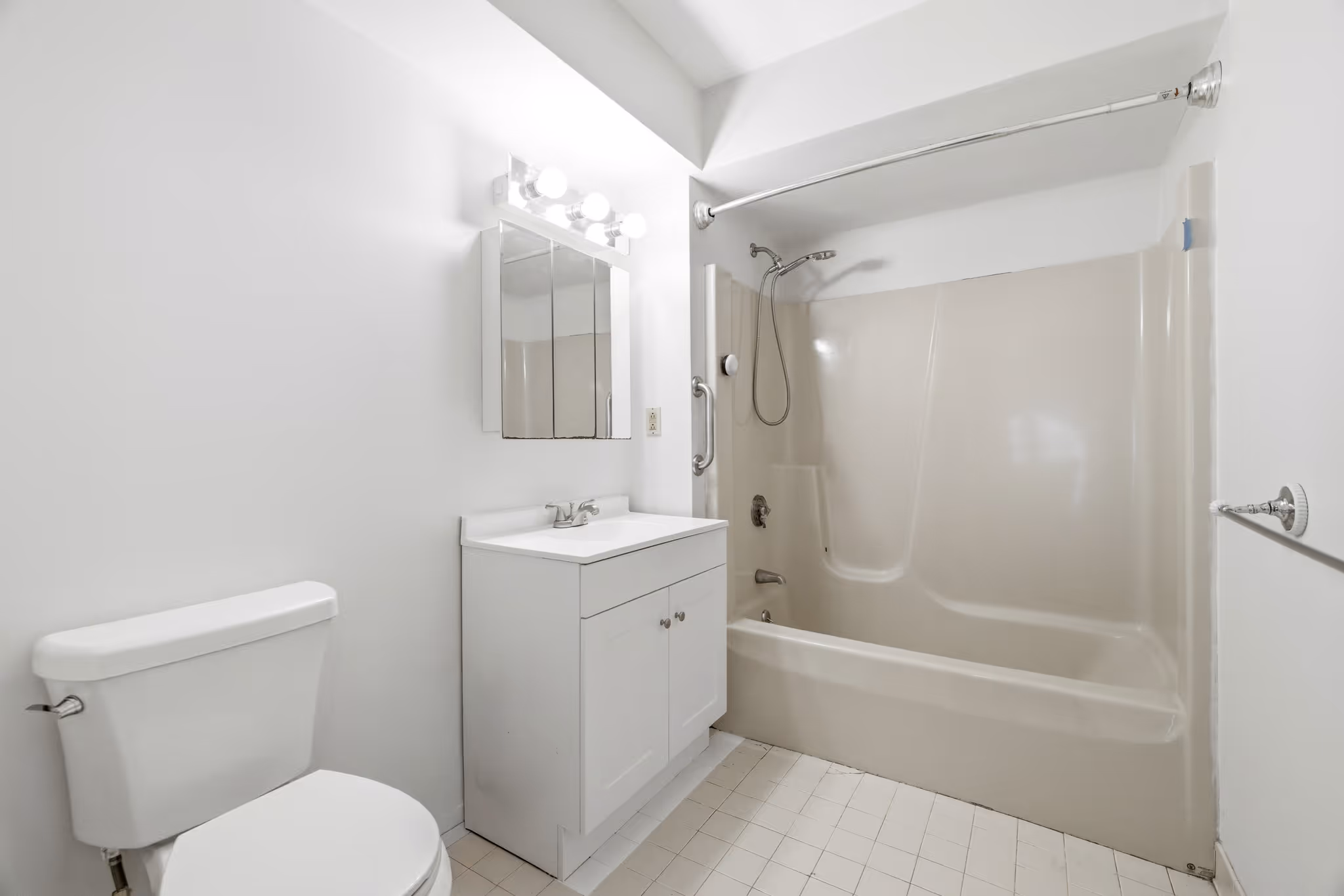 Bathroom with vanity and tub in Boston condo