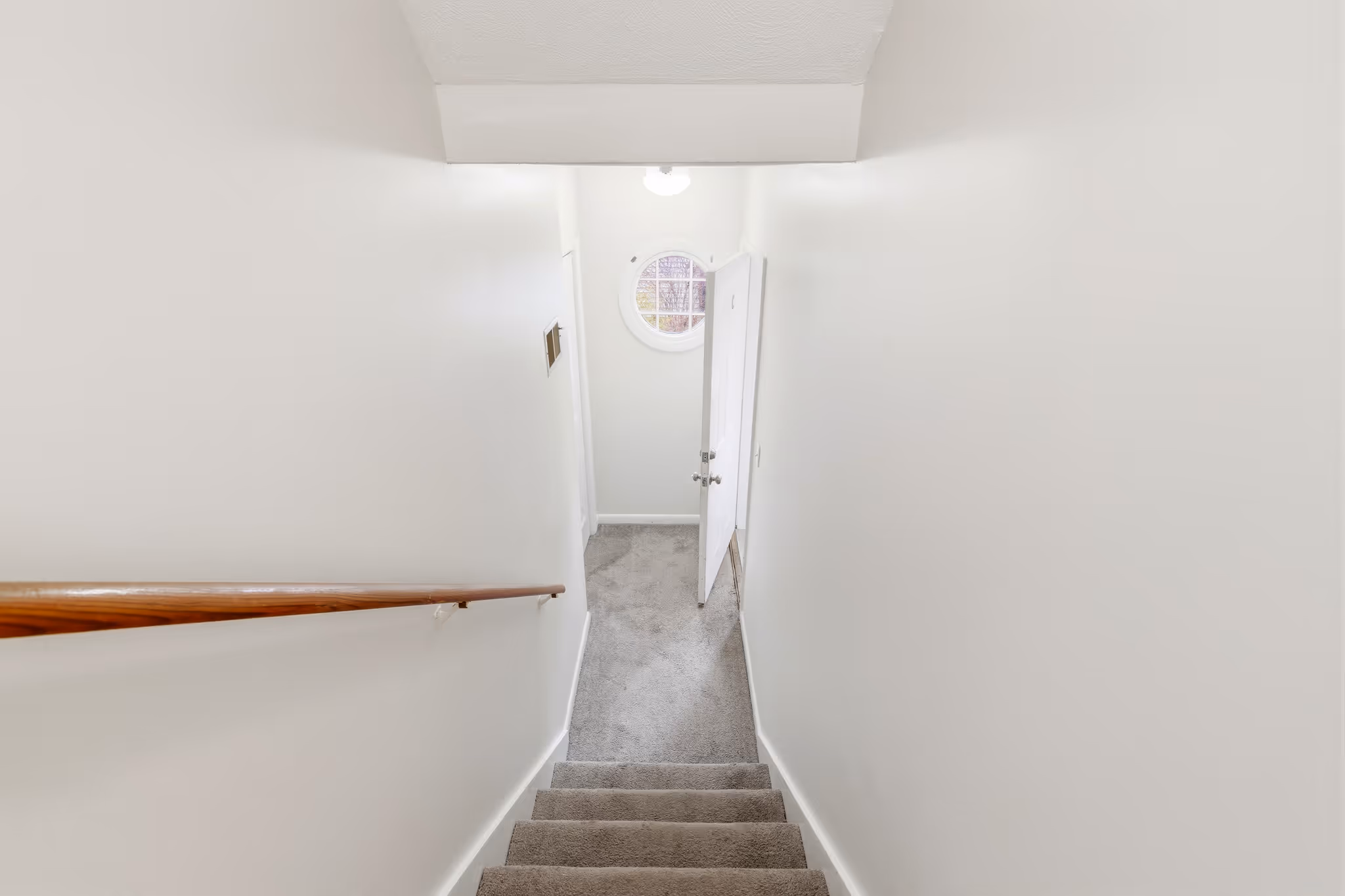 Interior stairs leading between floors in Boston condo