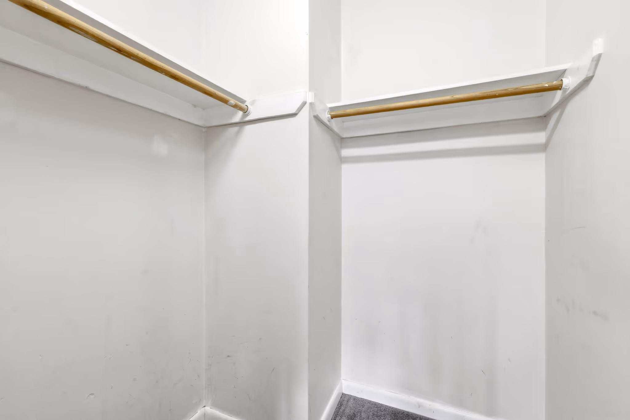 Walk in closet with shelving in Boston condo