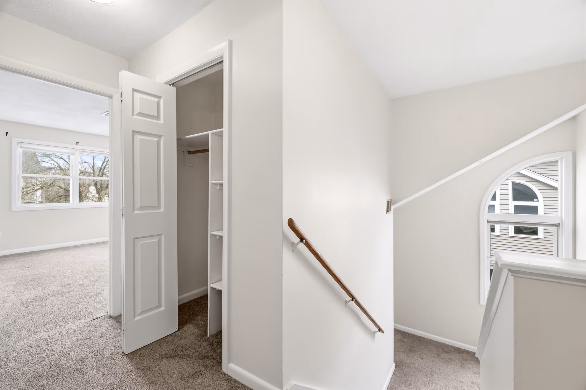 Hallway with access to rooms in Boston condo