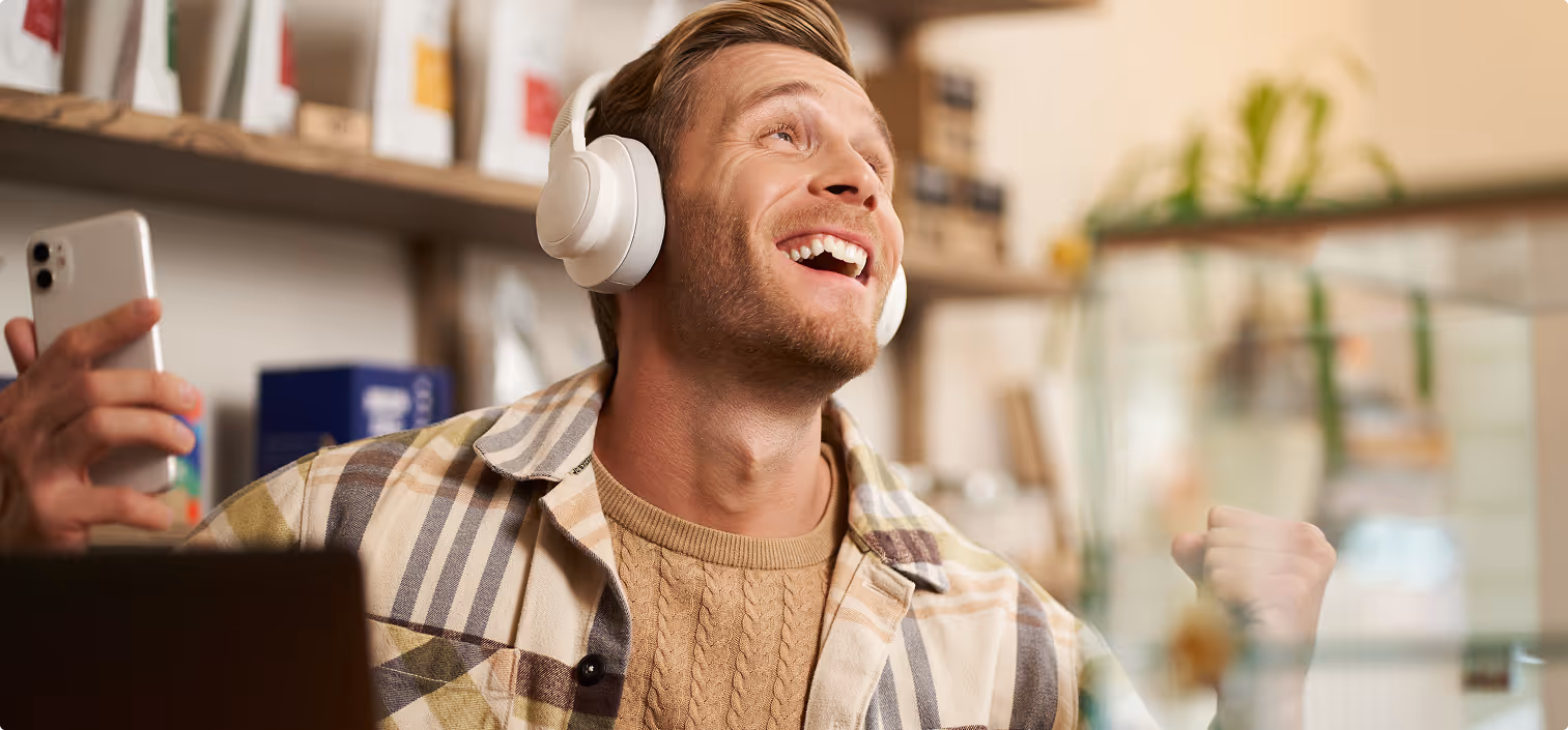 Man in headphones smiling