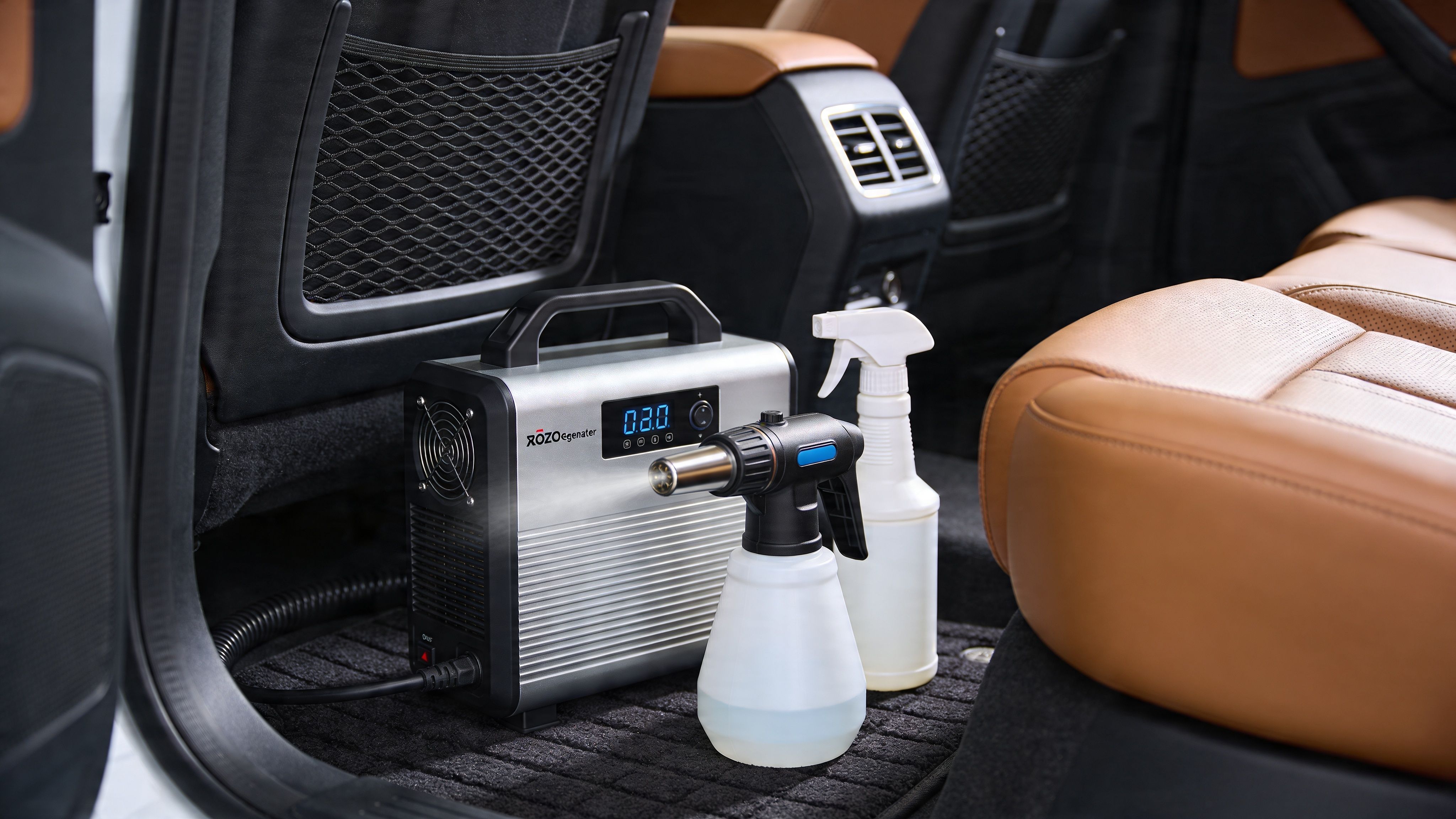 A professional ozone generator machine and a spray bottle being used to remove odors from a vehicle interior.