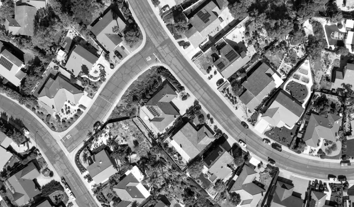 Black and white suburban homes, infrastructure protection