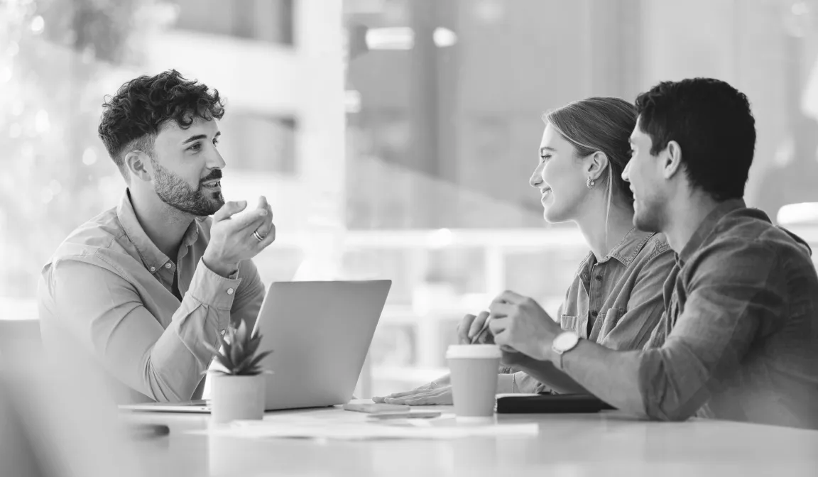 Black and white insurance meeting