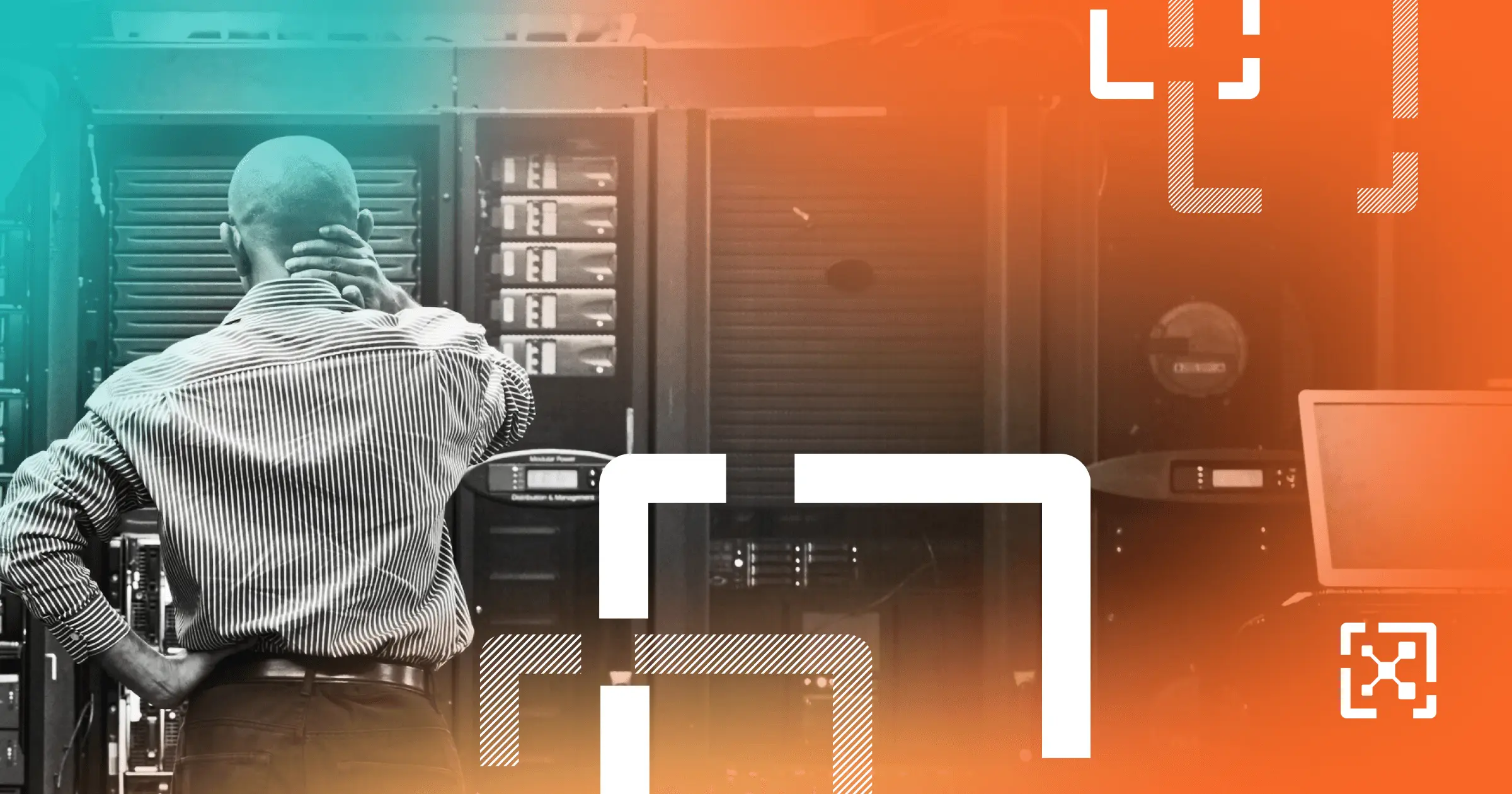 A cybersecurity professional standing in front of an on-premises server