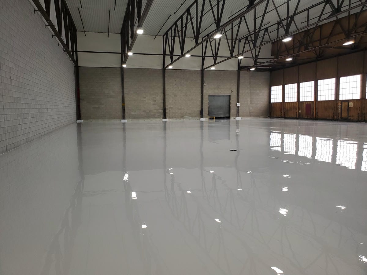 Selection of high-performance industrial floor and wall coatings, including epoxy, MMA and Urethane concrete for facility protection in SW Ontario.