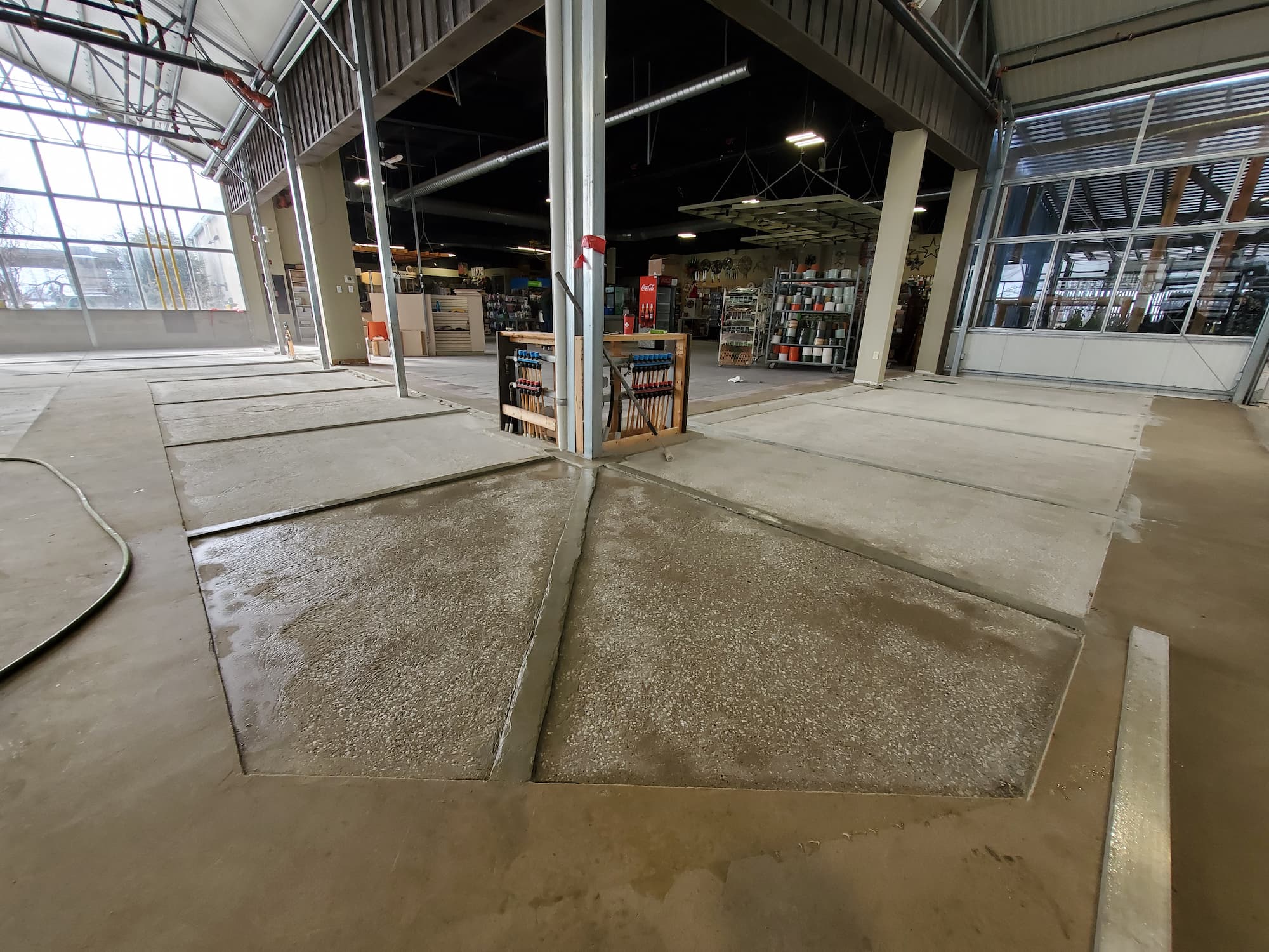Integrated food-grade facility systems: Antibacterial flooring, floor sloping, joint filling, and cove bases for SW Ontario plants.