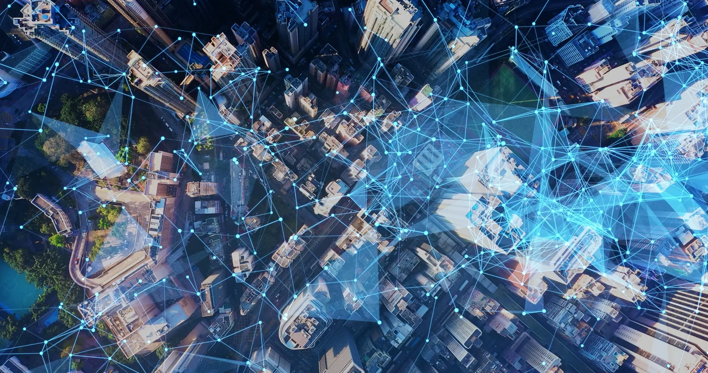 aerial view of a city with many buildings and lines