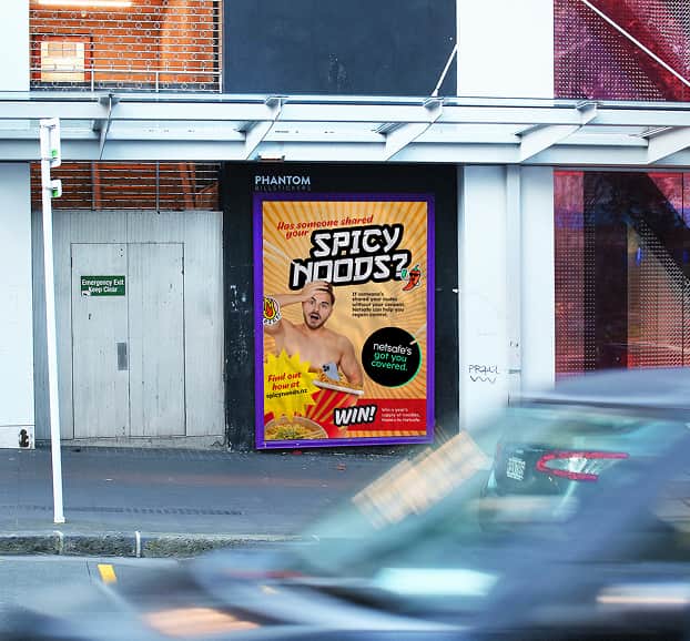 Photo of a street poster showing a Spicy Noods advertisement.