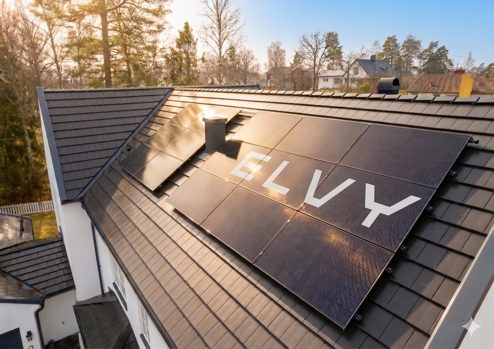 Tak med solceller och Elvys logga placerad över panelerna
