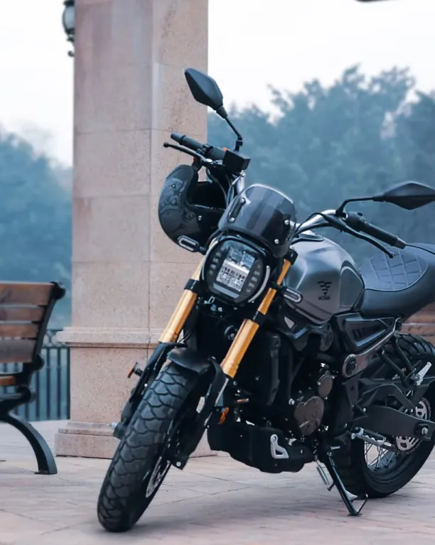 Front angled view of a VOGE 300ACX motorcycle parked outdoors, highlighting its rugged scrambler design.