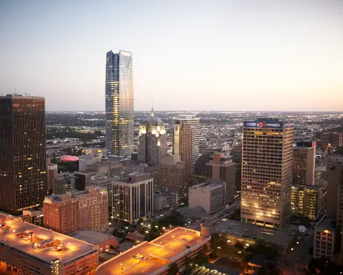 Oklahoma City skyline at sunset with tall skyscrapers and urban landscape