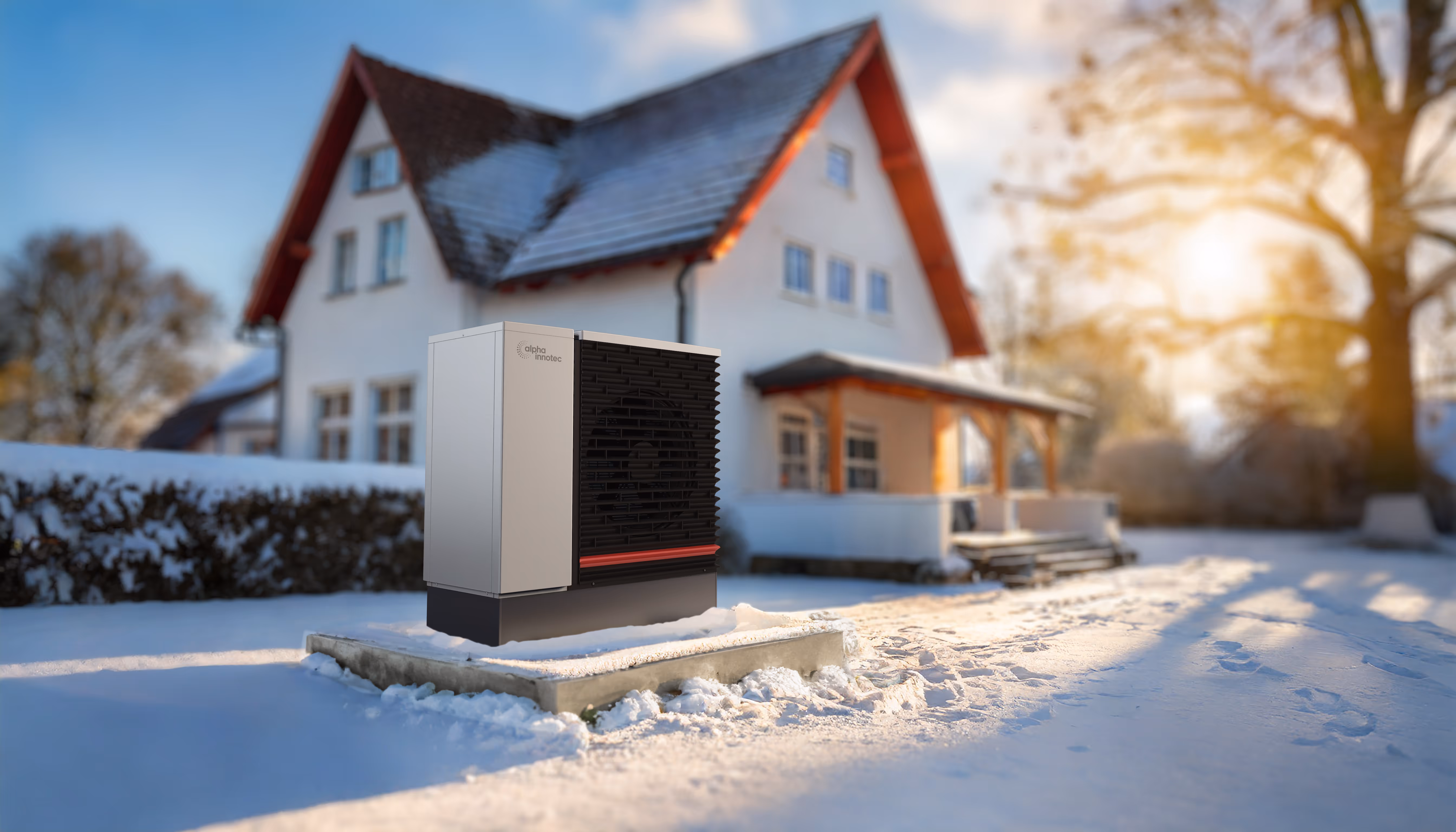 Beispielhaus im Winter mit einer Wärmepumpe